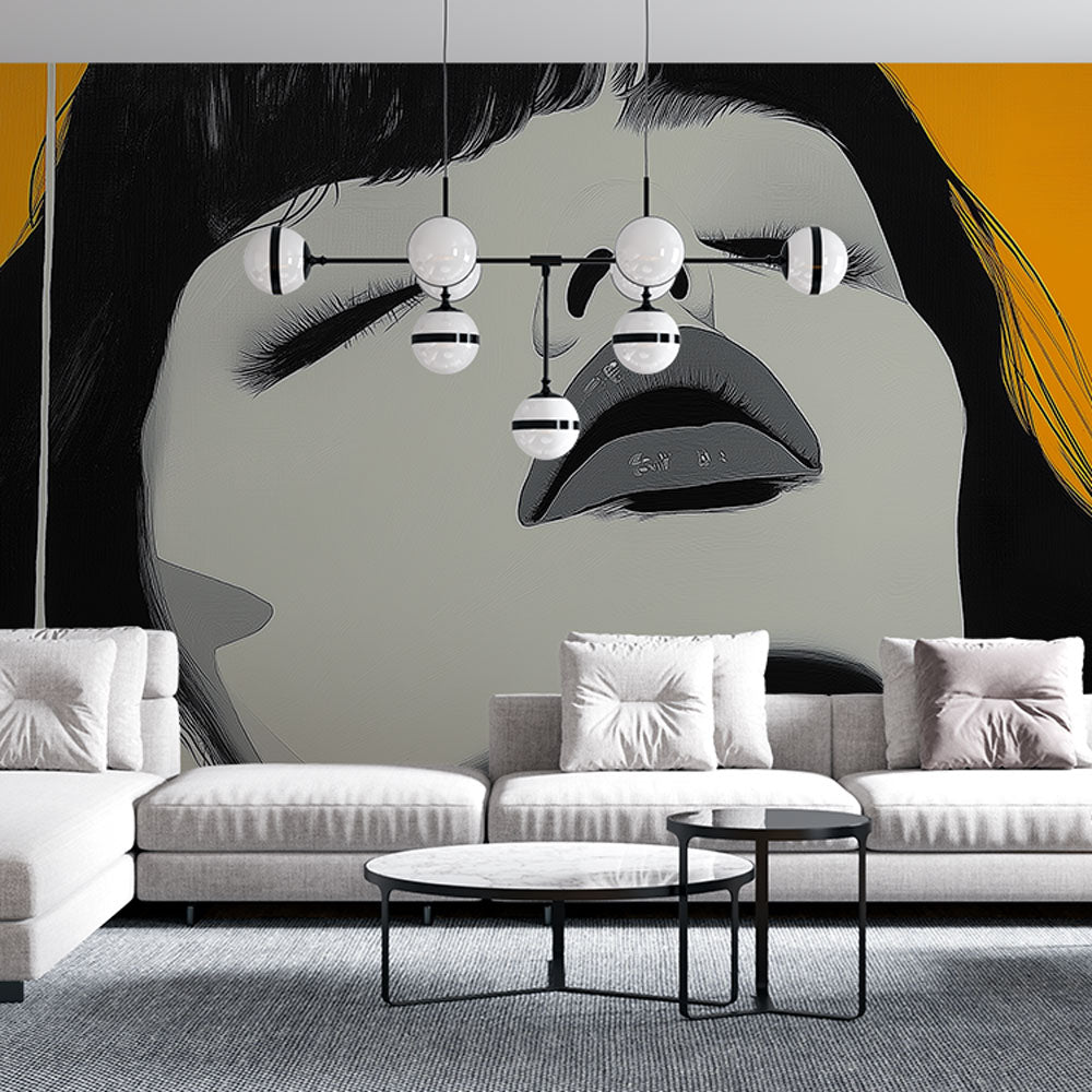 Abstract portrait wallpaper creating dramatic impact in a modern living room with black and white face art against orange