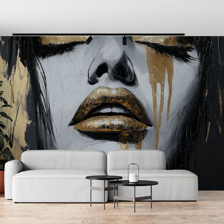 Abstract portrait wallpaper in gold and black creating drama in a modern living room with high ceilings