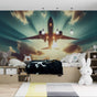 Airplane mural wallpaper creating a stunning focal point in a modern kid's bedroom, with warm sunset colors illuminating the space