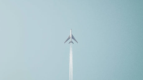 Minimalist airplane wallpaper design file showing clean lines and powder-blue sky pattern