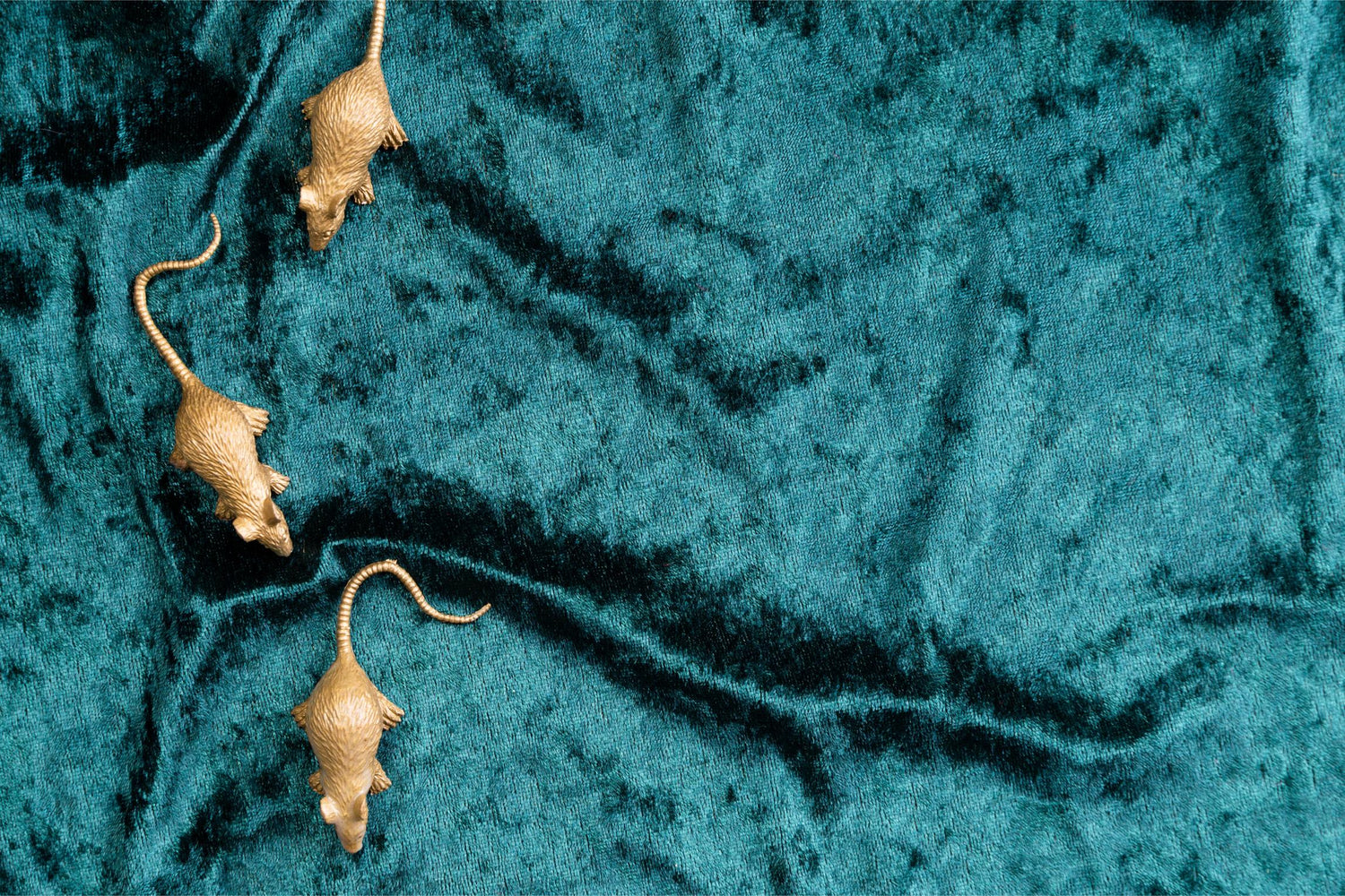 Golden mice on teal velvet design file showing intricate pattern details and rich color palette