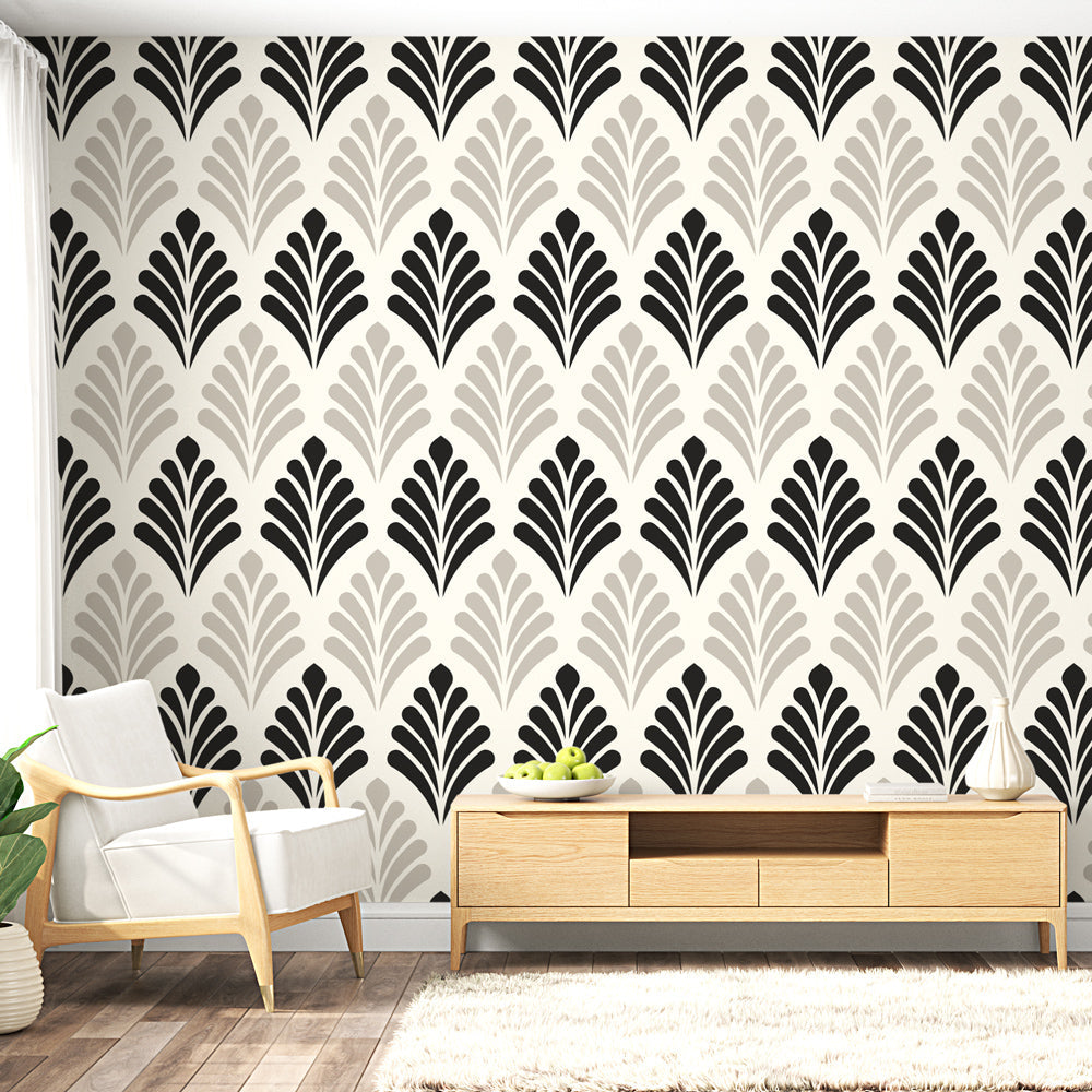 Art deco fan pattern wallpaper adding glamour to a modern dining room with black furniture and crystal chandelier