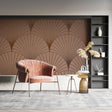 Art deco geometric fan pattern wallpaper in a modern living room with mid-century furniture and brass accents