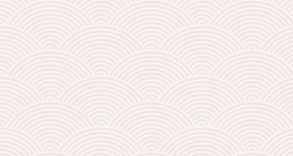 Art Deco geometric wave wallpaper in soft pastels creating a serene atmosphere in a modern living room setting