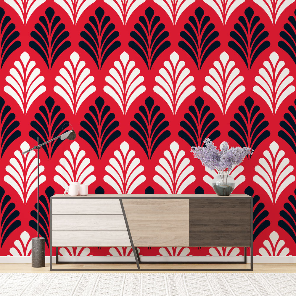 Art deco fan pattern wallpaper in red and black creating drama in a modern dining room with pendant lights
