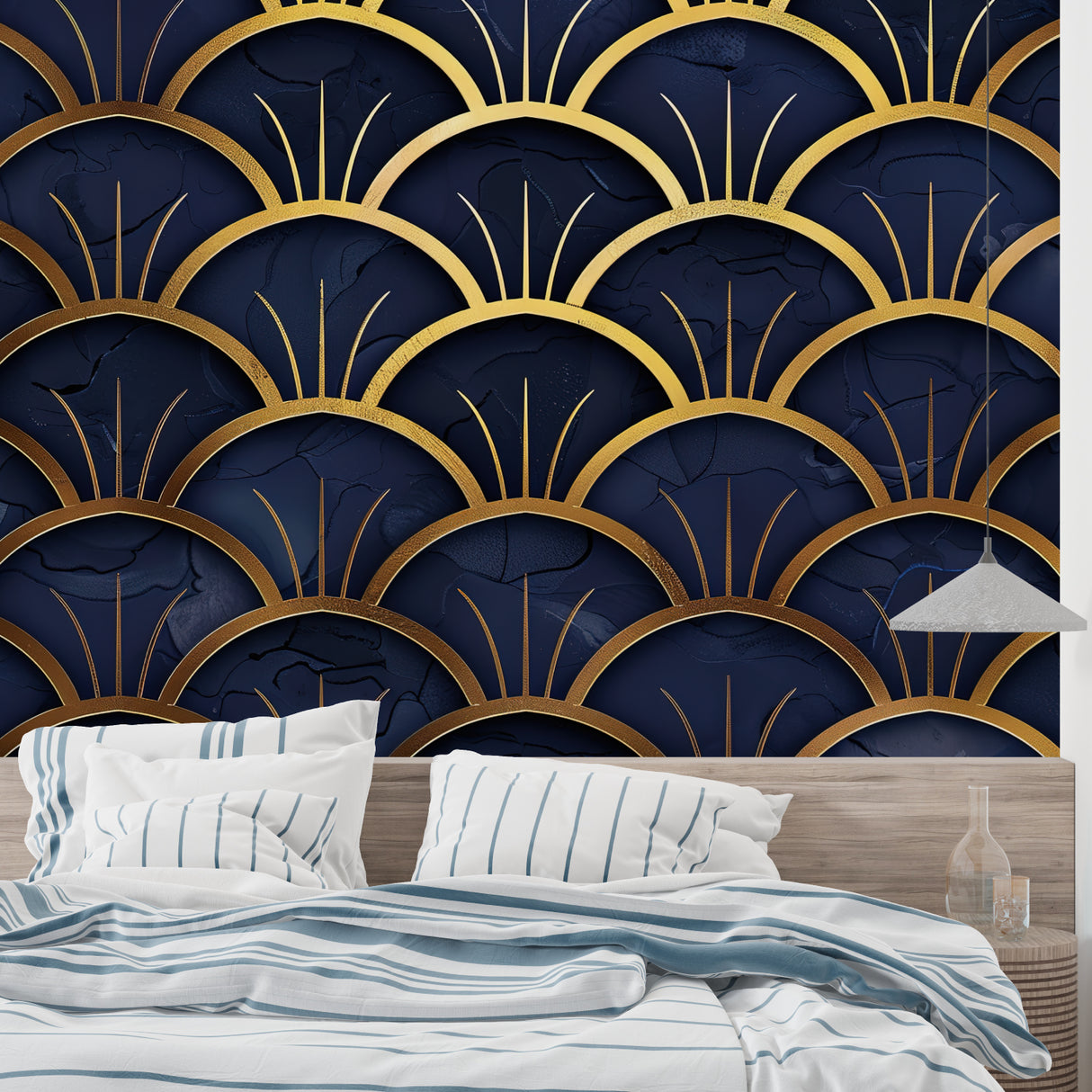 Navy and gold fan pattern wallpaper in home office with brass accents