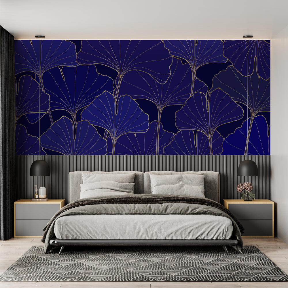 Navy and gold Art Deco wallpaper with ginkgo leaves pattern in modern living room creating elegant atmosphere