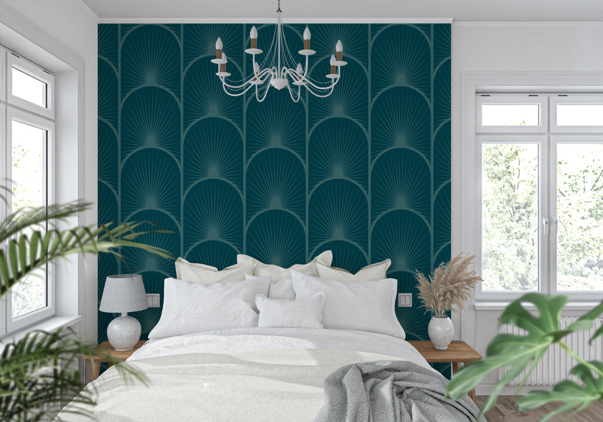 Geometric teal wallpaper pattern lighting up a master bedroom wall
