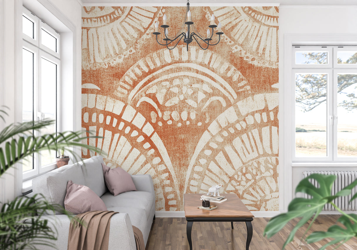 Art deco geometric wallpaper in warm terracotta tones creating an elegant statement wall in a modern living room