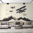 Aviation wallpaper in modern living room showing vintage planes and mountains creating depth and movement