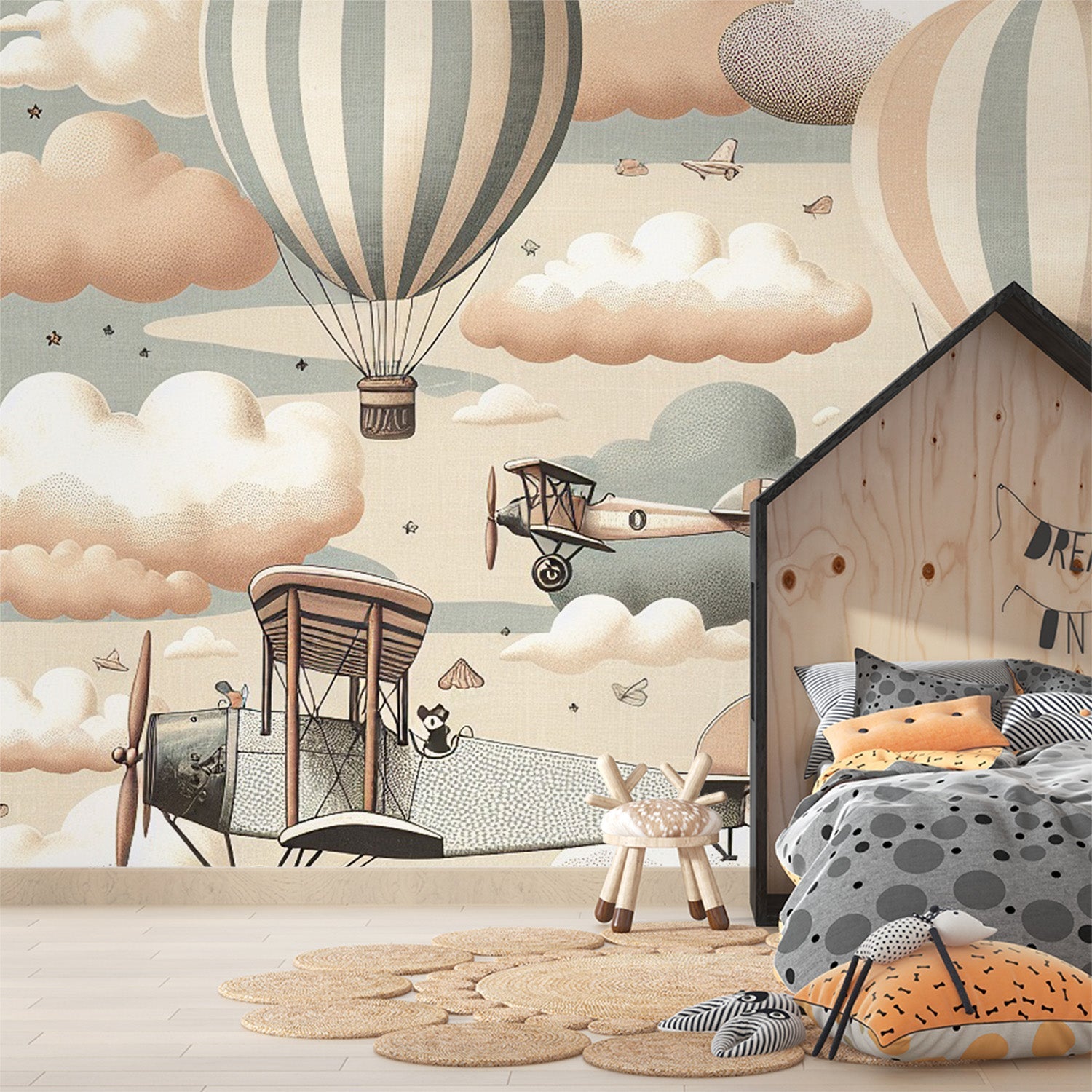 Aviation wallpaper creating a cozy reading nook with vintage hot air balloons floating above a comfortable chair