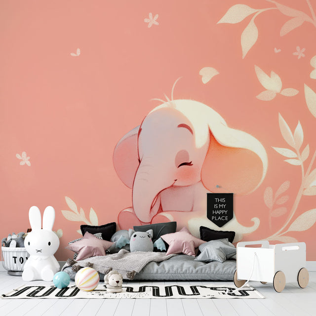 Pink baby elephant wallpaper beautifully styled in a modern nursery with white furniture and soft textiles