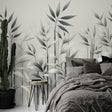 Bamboo forest wallpaper creating a serene atmosphere in a modern living room with gray furniture and natural light