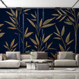 Navy and gold bamboo wallpaper creating an elegant atmosphere in a modern dining room with soft lighting