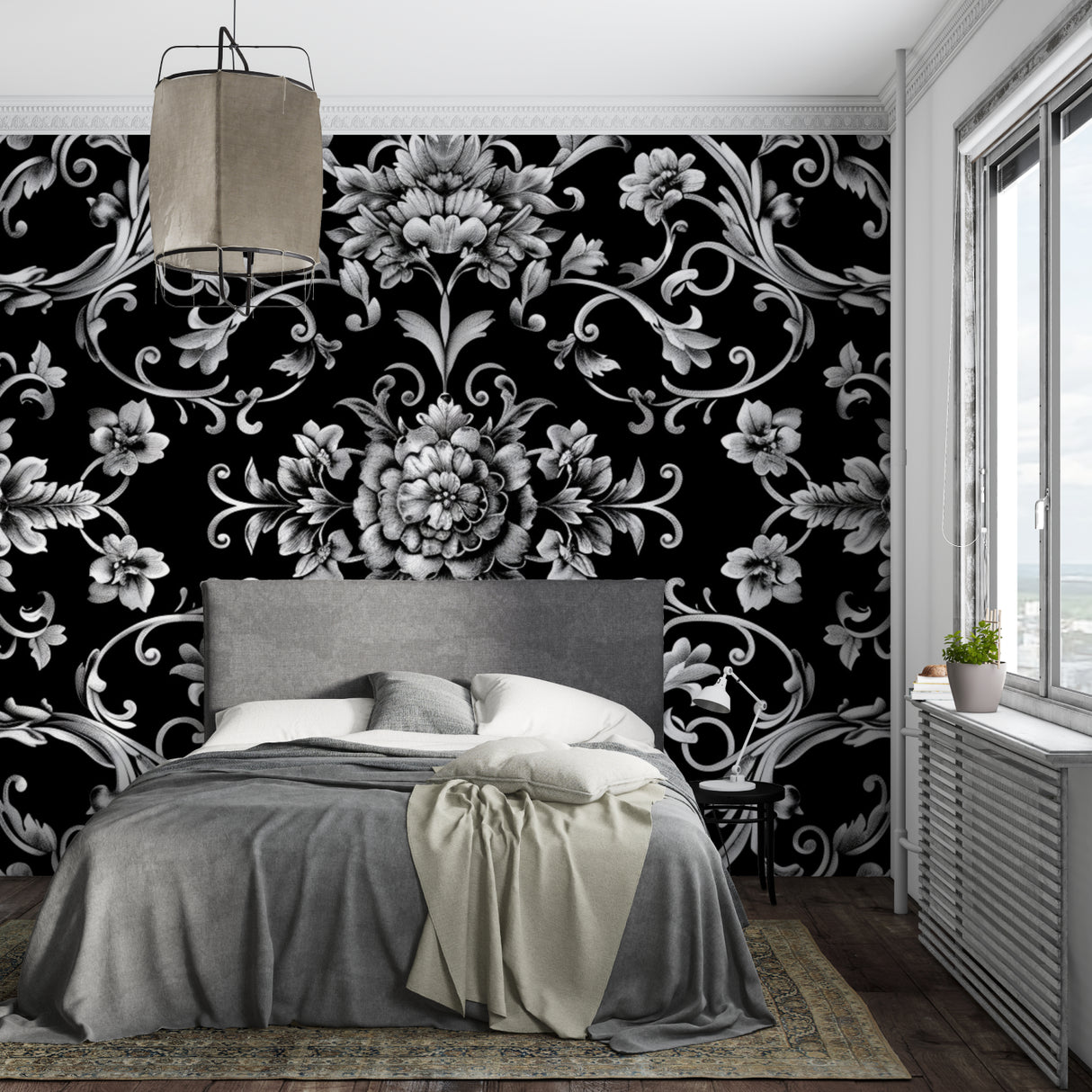 Black and silver baroque wallpaper creating drama in master bedroom
