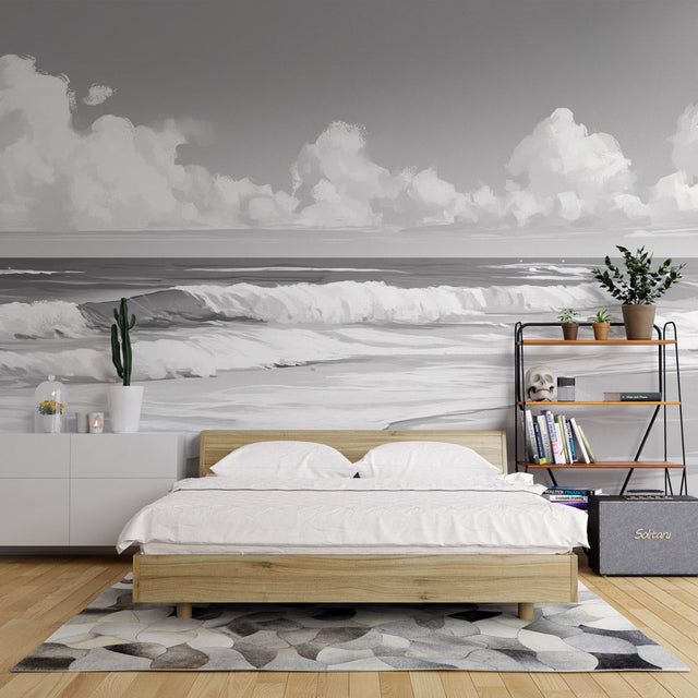 Black and white beach wallpaper creating a stunning focal point in a modern living room with minimalist furniture