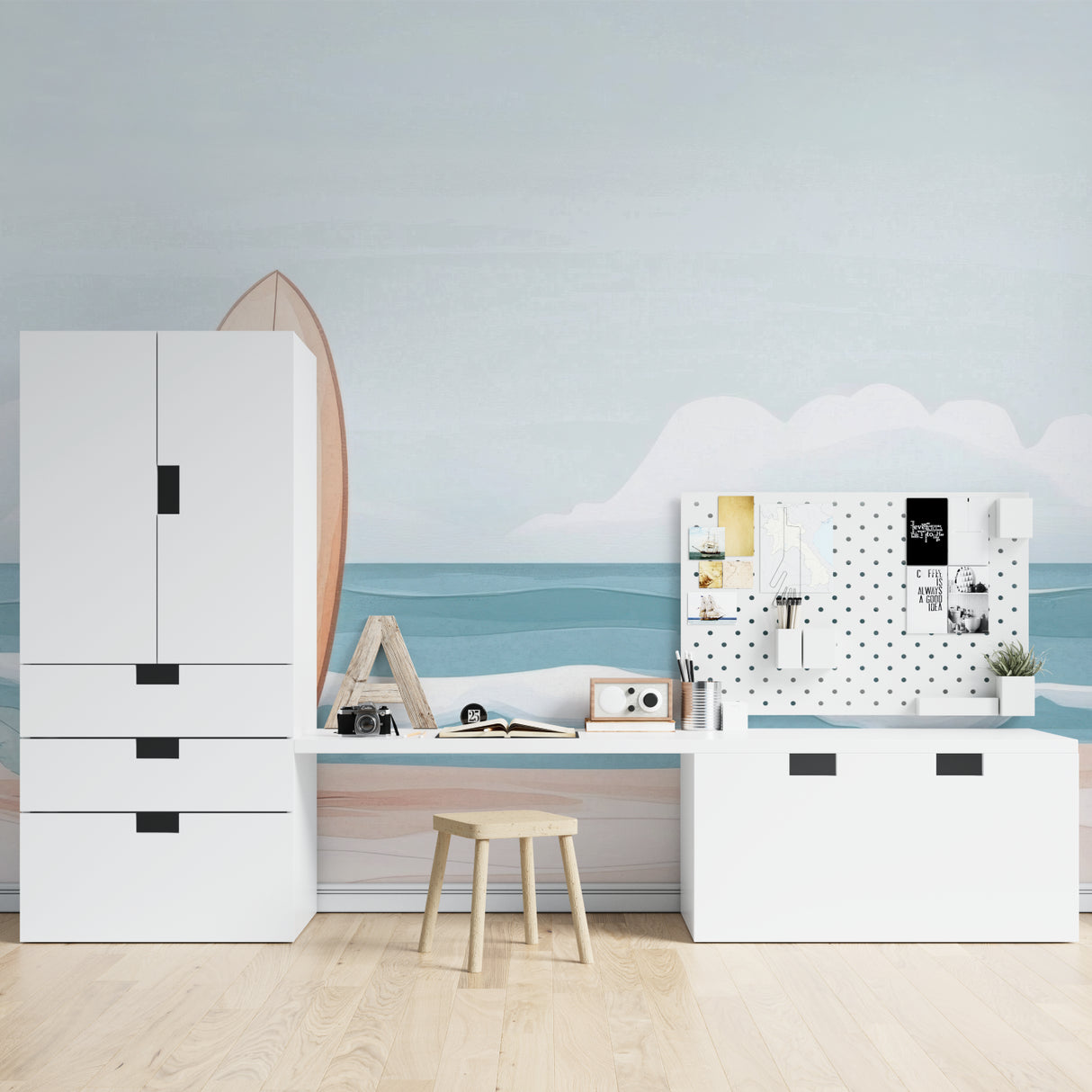 Beach mural with surfboard transforming kids playroom into coastal paradise
