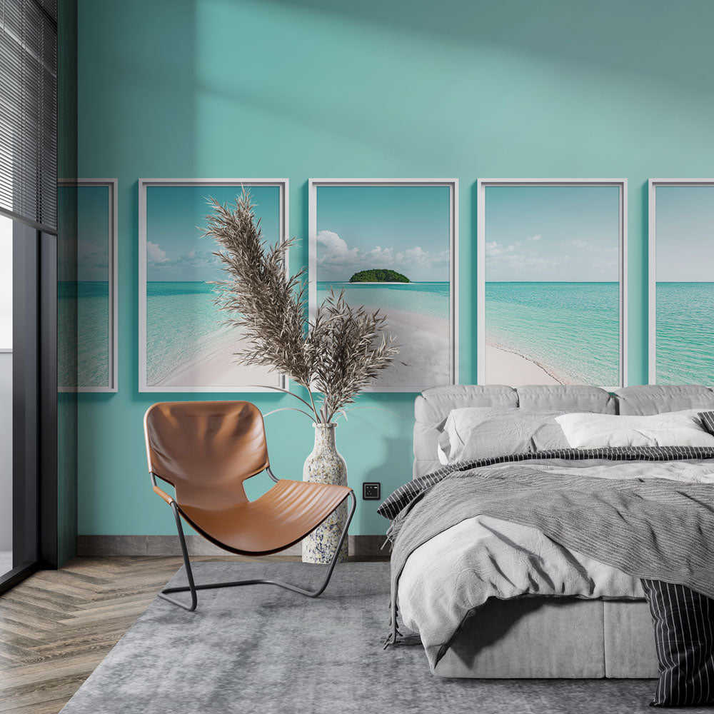 Tropical beach wallpaper creating a stunning backdrop in a modern living room with white furniture and natural light