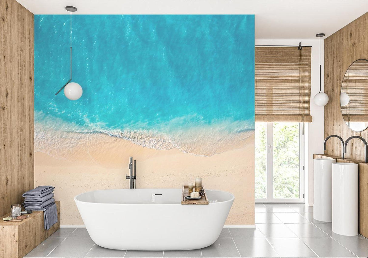Coastal beach wallpaper transforms bathroom into luxurious spa retreat