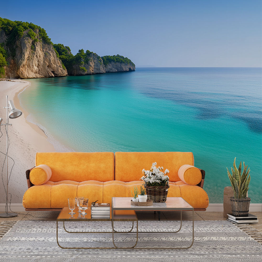 Beach mural wallpaper creating a stunning focal point in a modern living room with natural light highlighting the turquoise waters