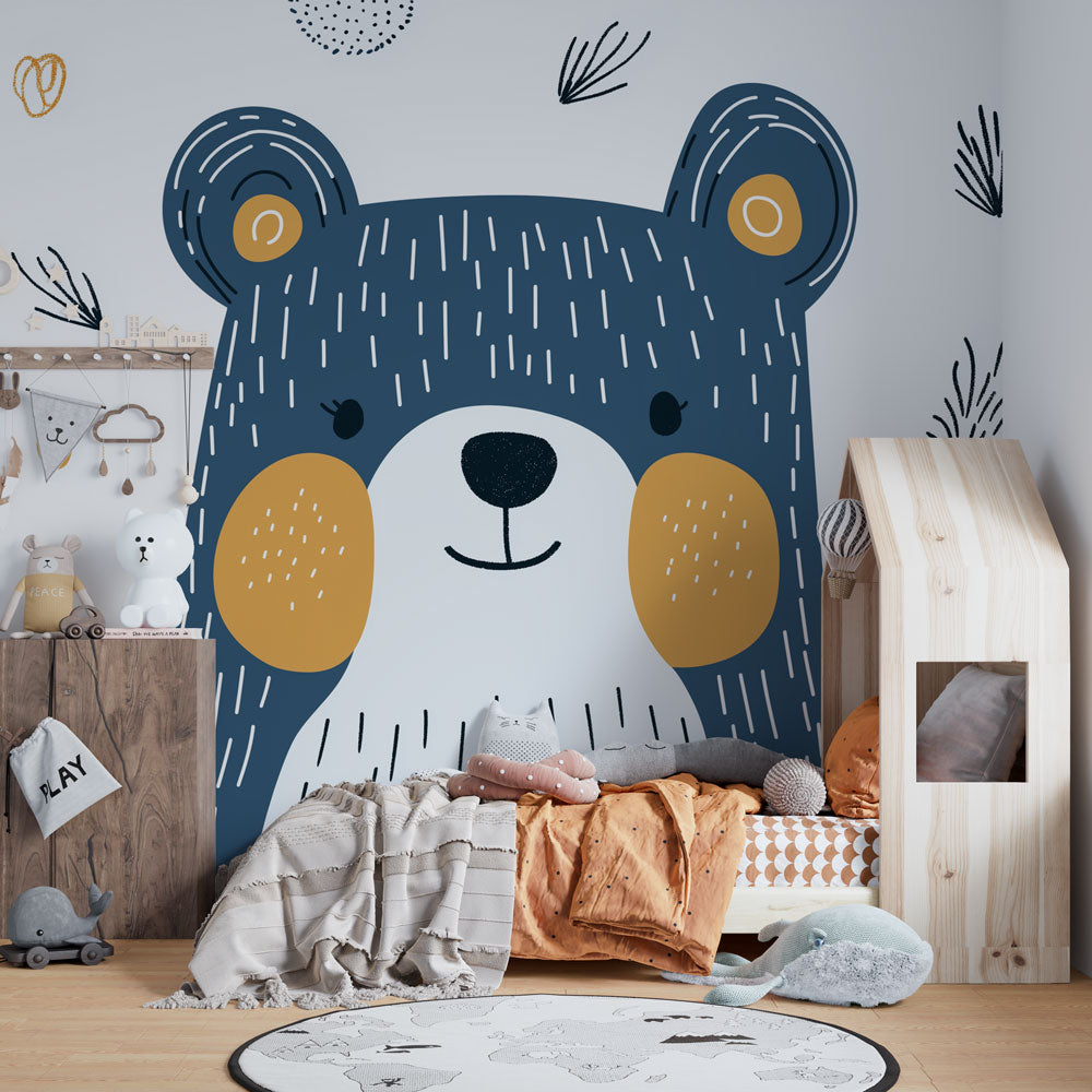 Modern Scandinavian bear wallpaper mural styled in a bright nursery with wooden furniture and soft textiles