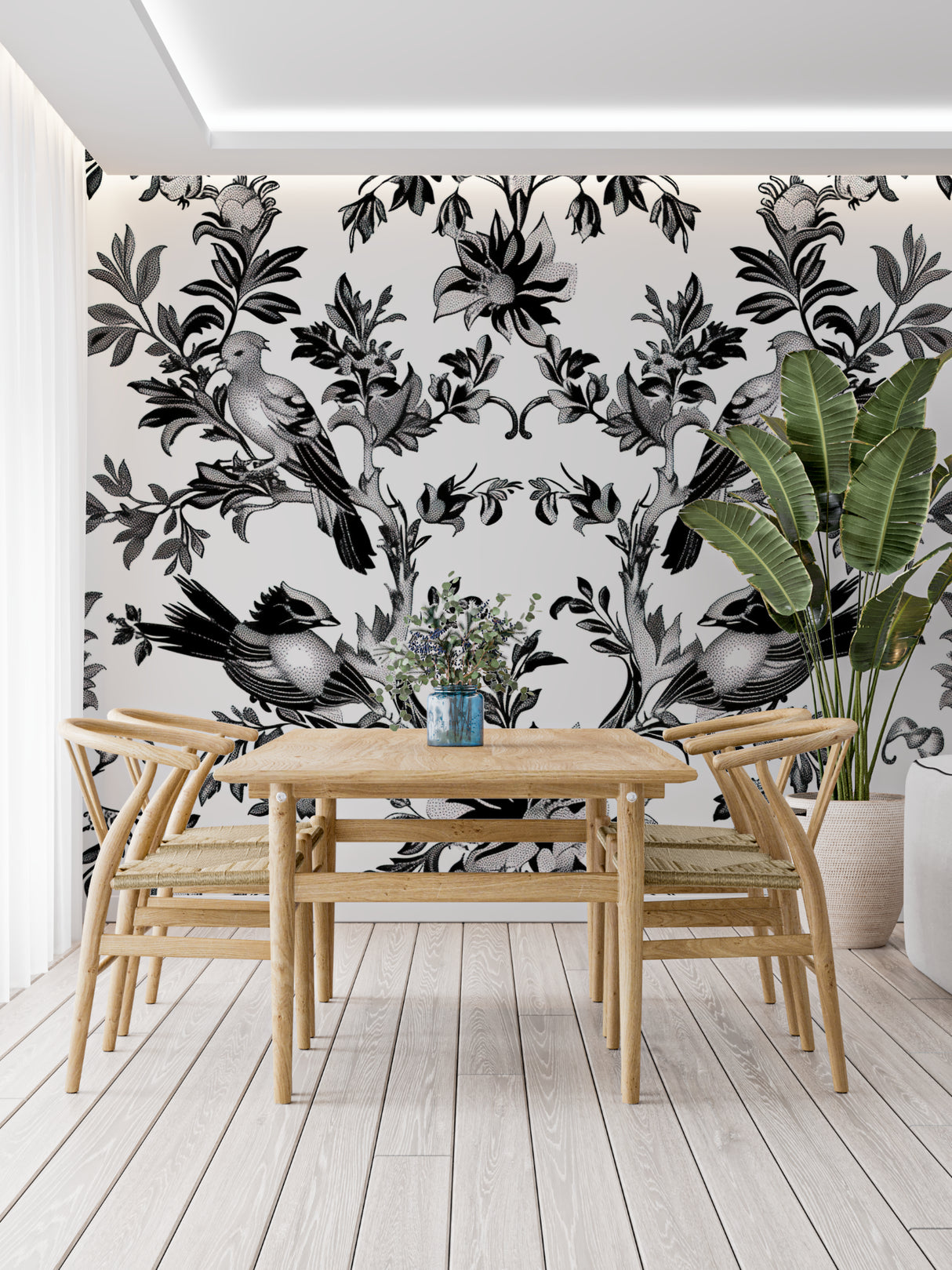 Home office space with monochrome bird wallpaper adding sophisticated touch