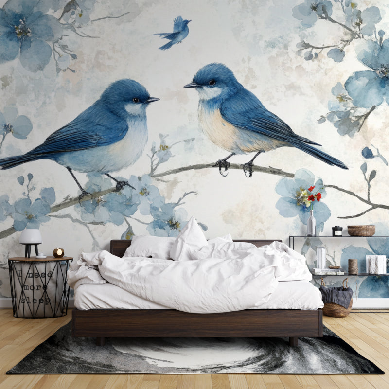 Bird wall mural featuring blue songbirds in cozy living room setting