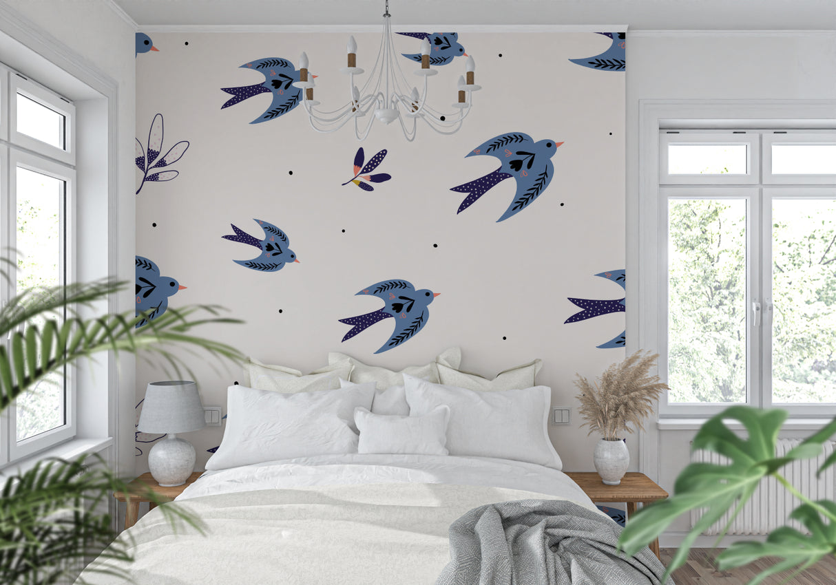 Blue swallows birds wallpaper creating a serene atmosphere in a modern living room with natural light