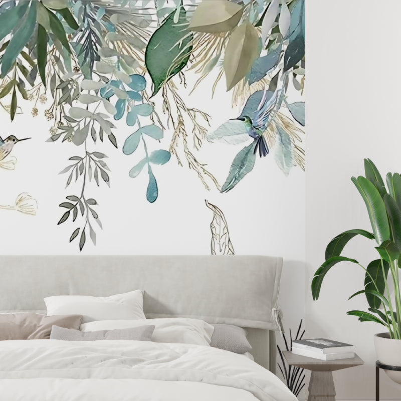 Watercolor leaves and birds transforming a bathroom into a tropical retreat