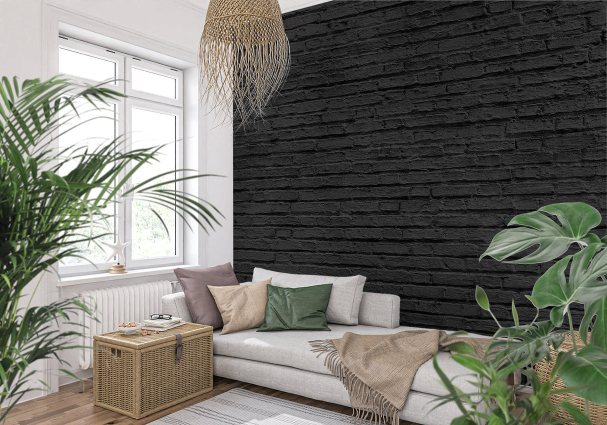 Black brick wallpaper in modern living room creating industrial charm with leather sofa and metal accents