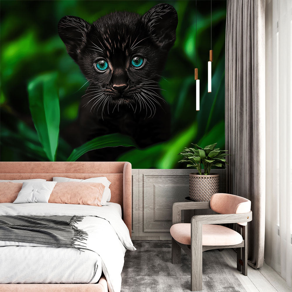 Black cat jungle wallpaper displayed in a modern living room, showing the striking contrast between dark feline and green foliage