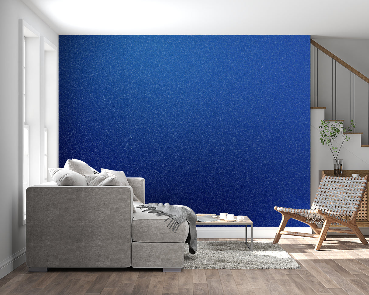 Gold line art wallpaper creating drama in a minimalist dining room