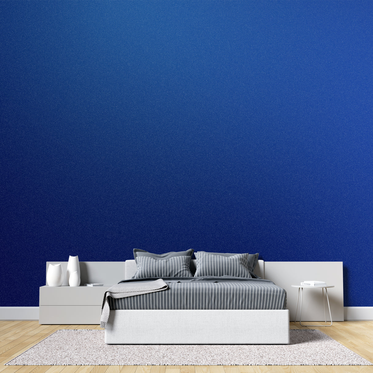 Blue and gold wave pattern mural in a modern home office space