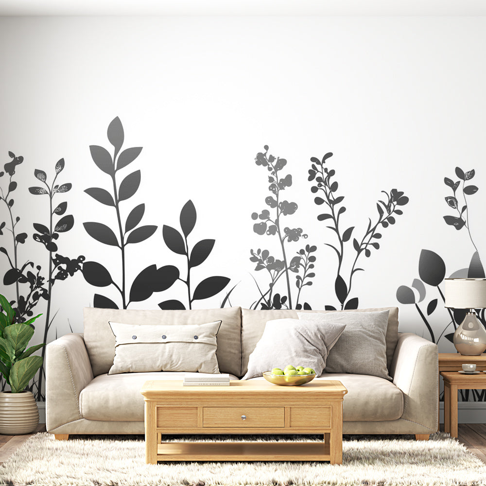 Black and white botanical wallpaper in modern dining room showing garden silhouettes creating depth and sophistication