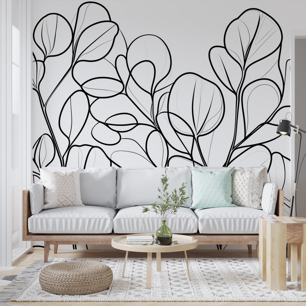 Black and white botanical line art wallpaper in modern living room creating a fresh gallery-like atmosphere