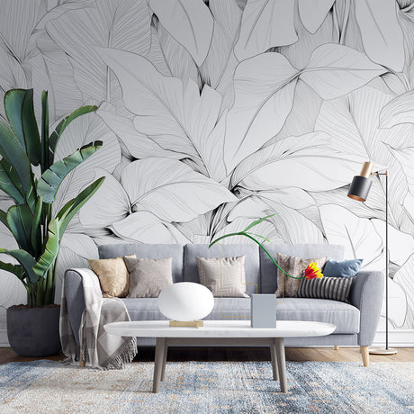 Botanical line art wallpaper in modern living room showcasing black and white leaf design