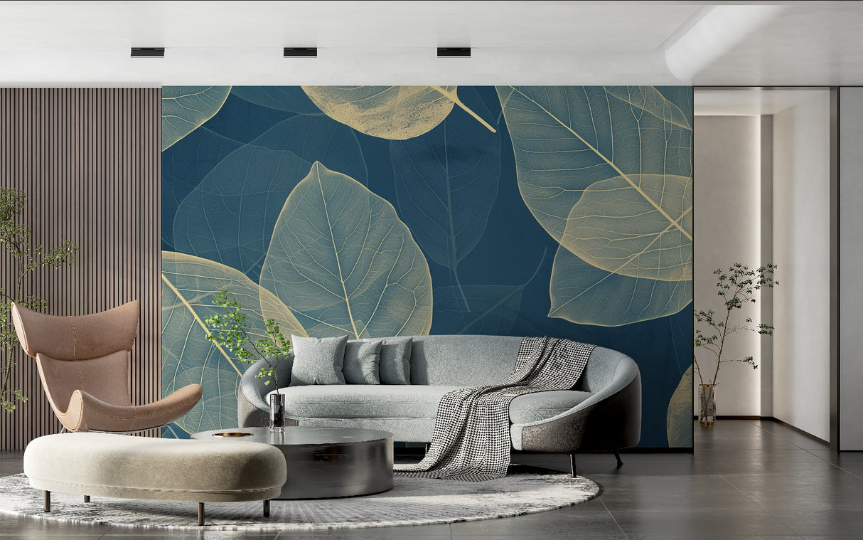 Botanical gold leaf wallpaper creating a luxurious atmosphere in a modern living room with soft lighting