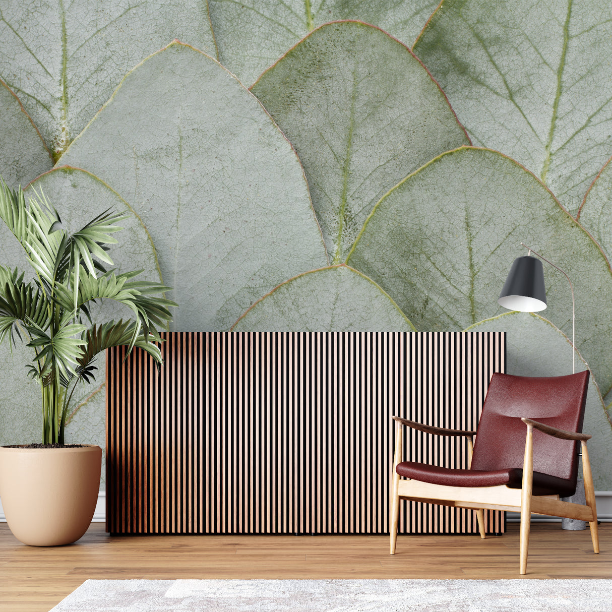 Botanical leaf wallpaper bringing fresh energy to a modern living room with white furniture