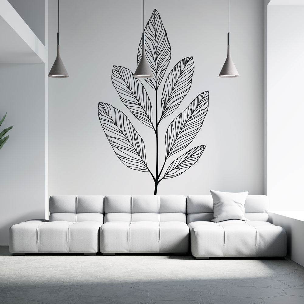 Black leaf line art mural wallpaper creating a modern statement wall in a bright living room with minimal furniture