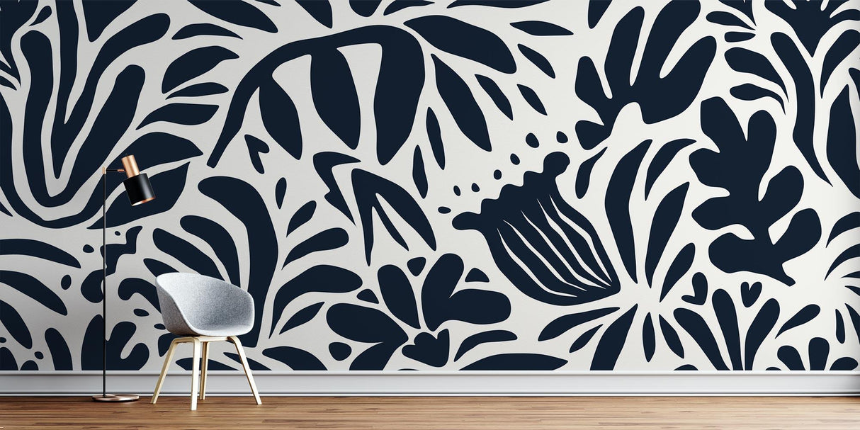 Modern botanical wallpaper creating dramatic impact in a minimalist living room with black and white contrasts