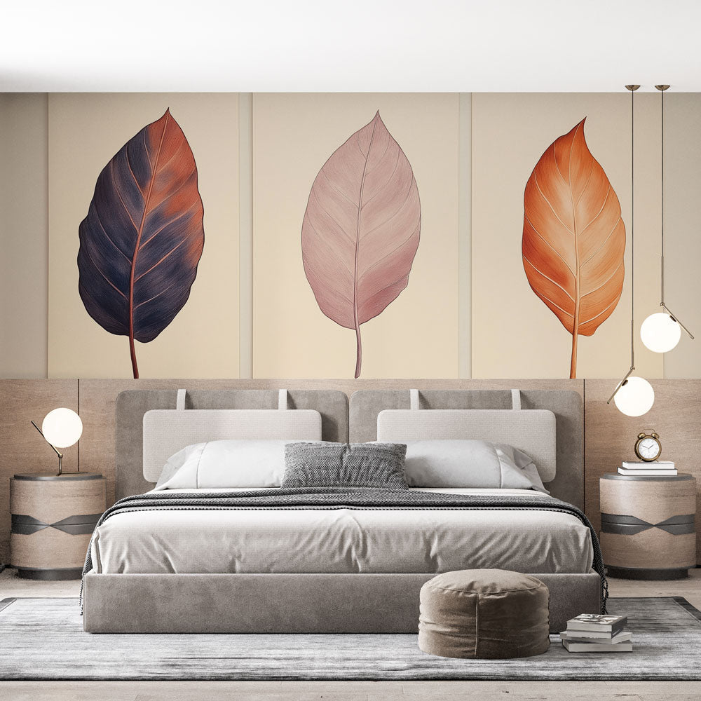 Modern botanical leaf wallpaper in terracotta and pink tones styled in a bright living room with minimal furniture