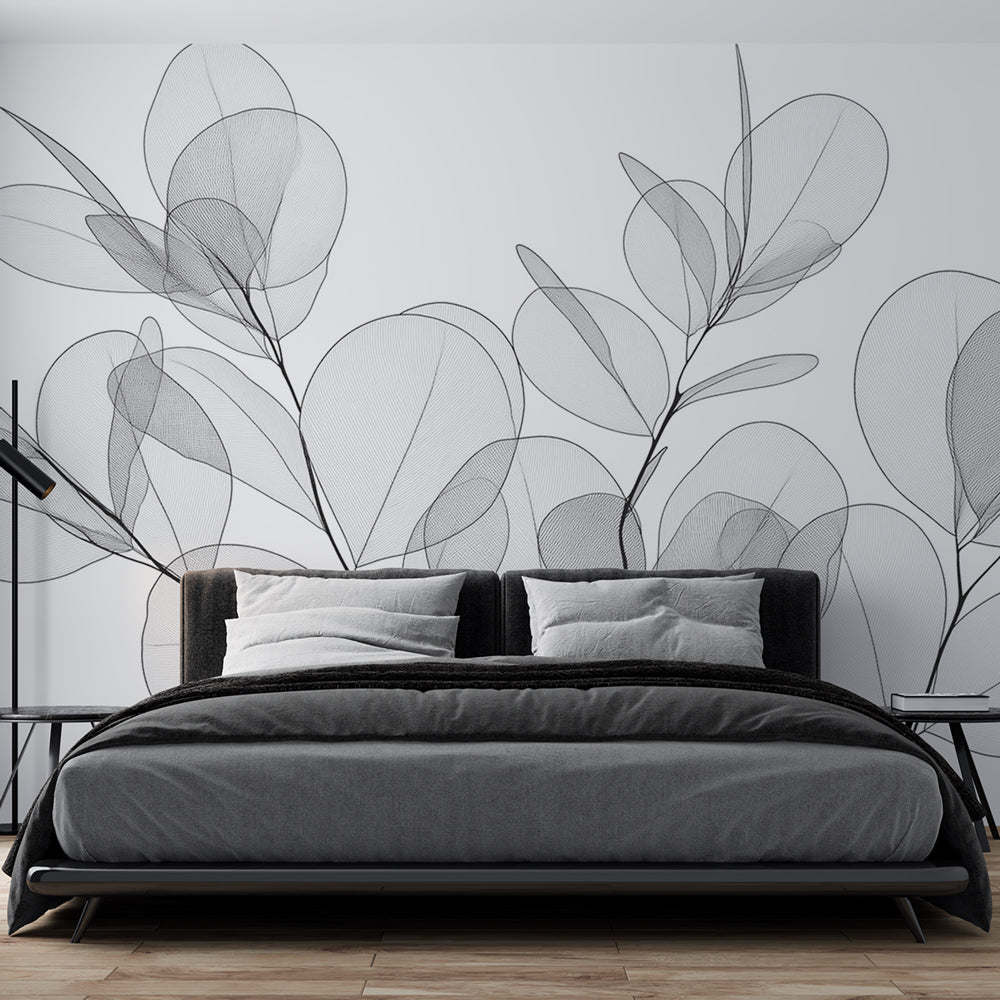 Botanical X-ray eucalyptus wallpaper creating a serene atmosphere in a modern living room with natural light