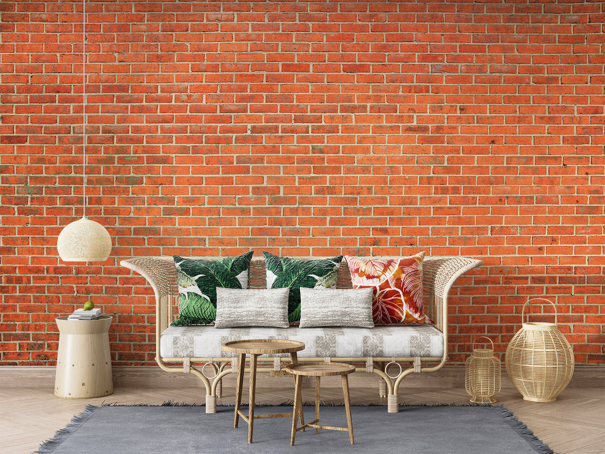 Industrial brick wallpaper in home office with wooden desk and black chair