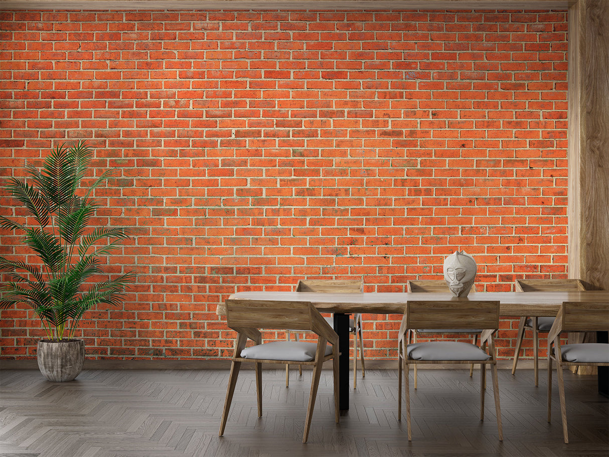 Red brick mural wallpaper in dining room with pendant lights and rustic table