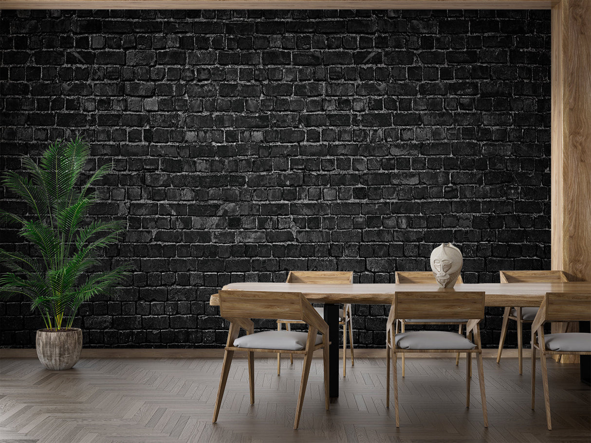 Industrial black brick mural in restaurant setting showing texture detail