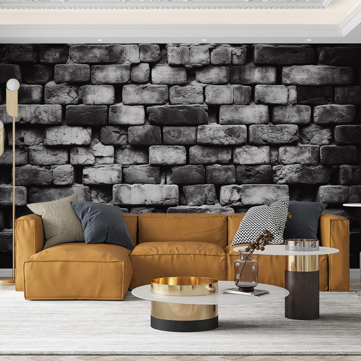 Black brick wallpaper creating dramatic impact in modern living room with grey sofa and industrial lighting