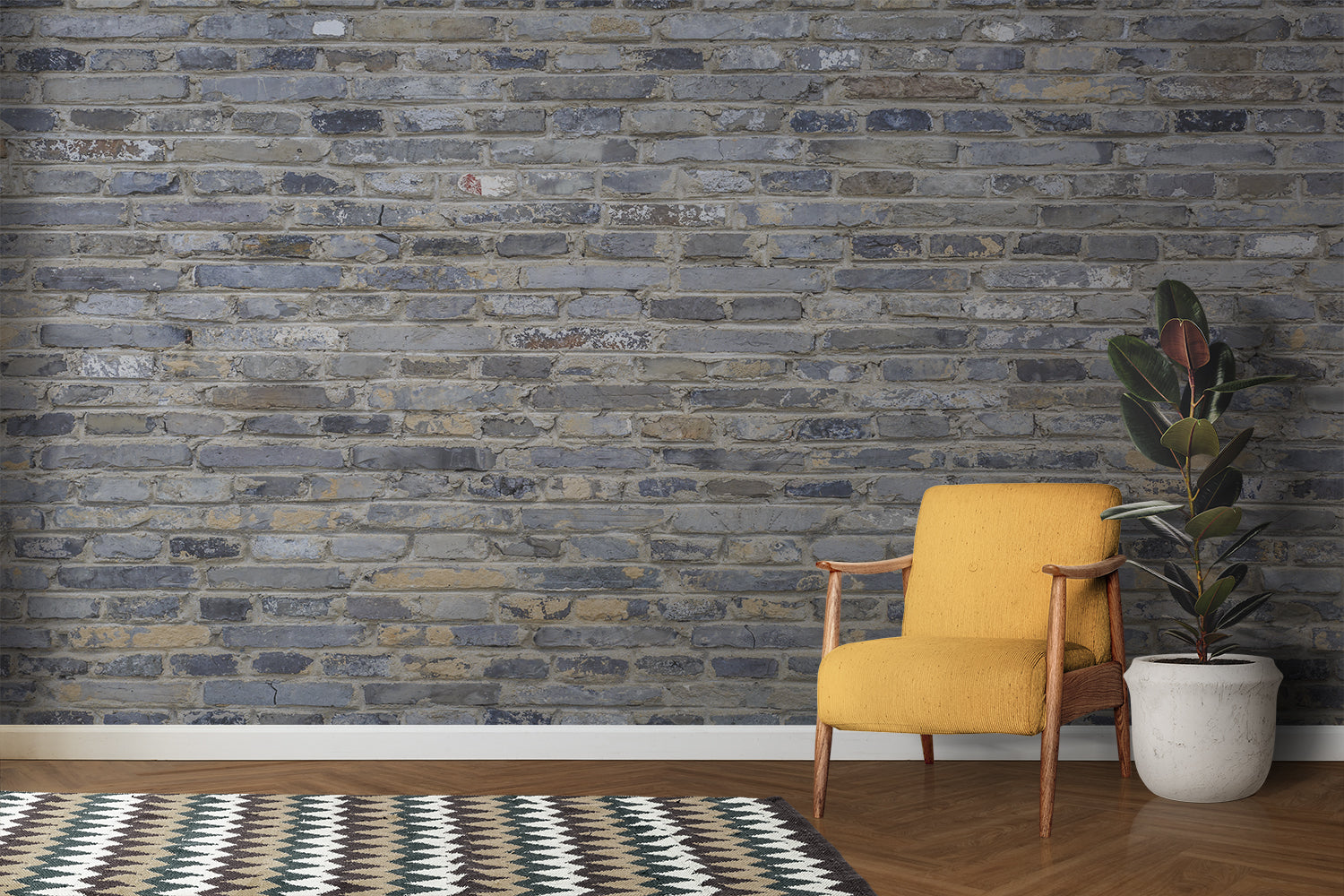 Industrial grey brick wallpaper in modern living room with leather sofa and metal accents