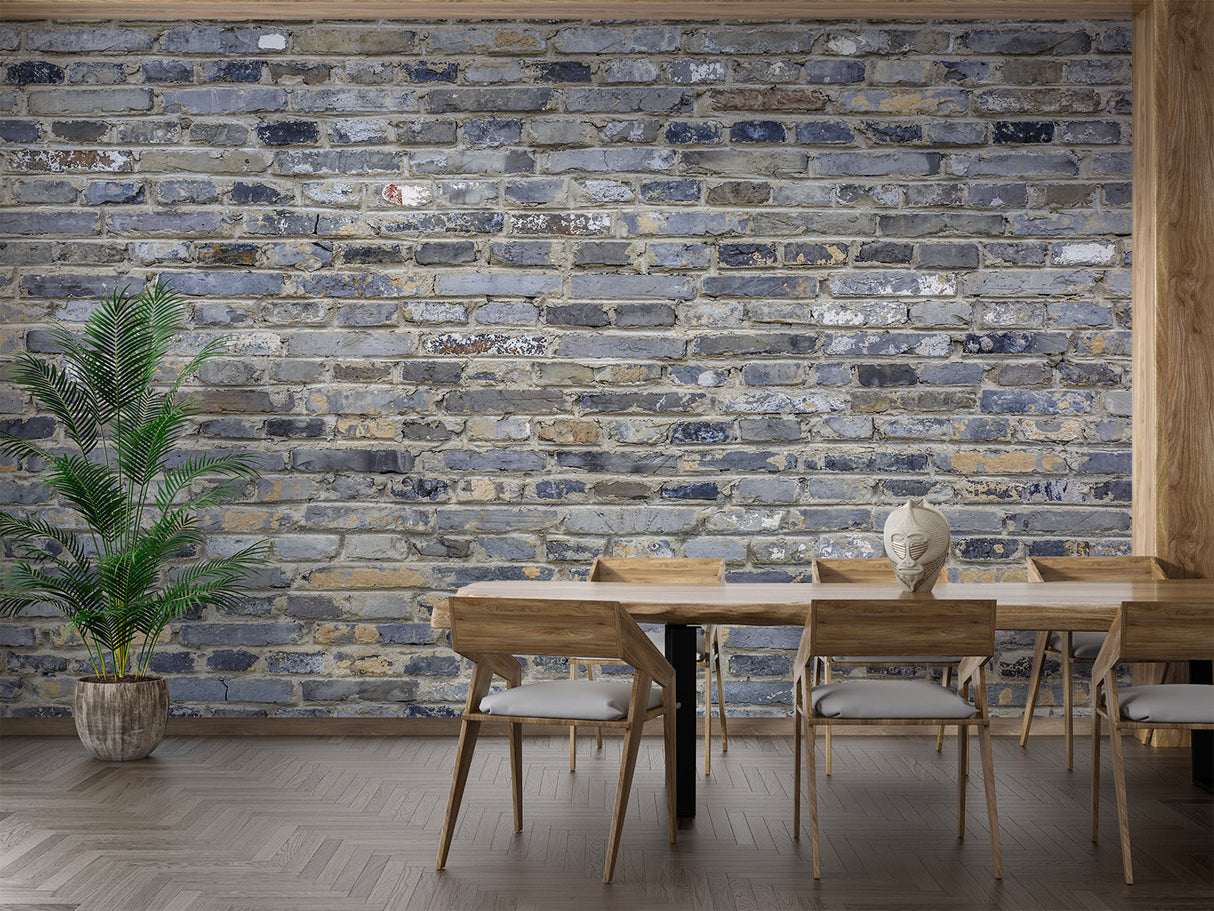 Blue-grey brick wallpaper creating accent wall in urban dining room