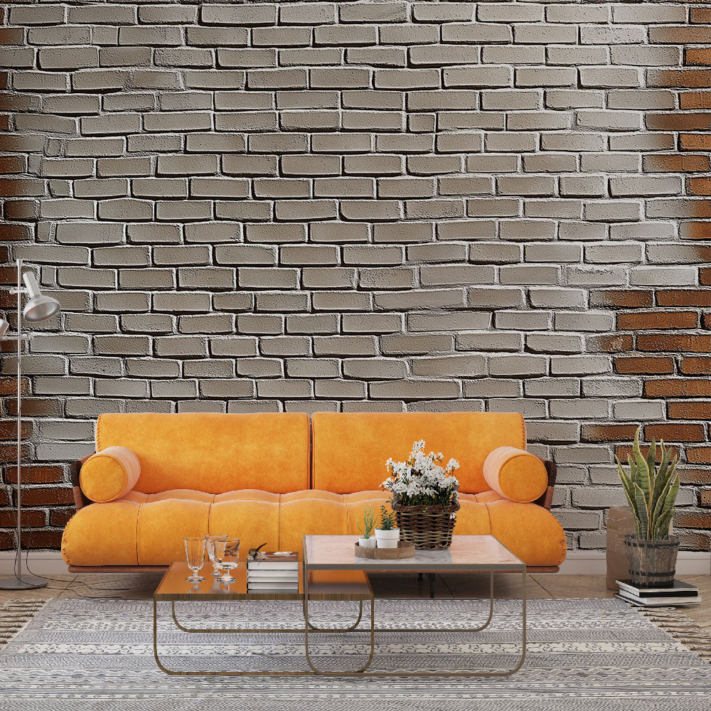 Modern living room featuring Industrial Brick Mural Wallpaper in grey and terracotta tones creating a sophisticated urban atmosphere
