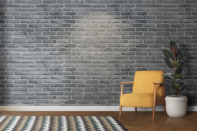 Industrial Grey Brick Wallpaper in modern living room with minimal furniture and large windows